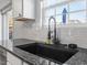 Close-up of sink with a view of the window at 1005 Cookwood Ct, Raleigh, NC 27610