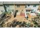 Backyard view of the townhomes shows individual fenced yard spaces with patios and sliding glass door access to living areas at 107 Vickery Hill Ct, Durham, NC 27703