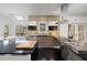 Bright kitchen with modern appliances, skylight and breakfast nook with views of the outdoors at 108 N Fern Abbey Ln, Cary, NC 27518