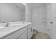 Modern bathroom features double vanity sinks, a large mirror and a shower-tub combo at 110 Lodgepole Ln, Burlington, NC 27215