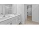 Bright bathroom features double sinks, white cabinets and a walk-in shower at 110 Lodgepole Ln, Burlington, NC 27215