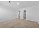 Neutral bedroom with a walk-in closet and adjoining rooms at 110 Lodgepole Ln, Burlington, NC 27215
