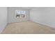 Bright bedroom filled with natural light, featuring neutral paint and soft carpet at 110 Lodgepole Ln, Burlington, NC 27215