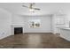 Bright living room features hardwood floors, a fireplace and ceiling fan at 110 Lodgepole Ln, Burlington, NC 27215