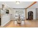 Dining room with wood floors and large picture window at 11408 Hickory Grove Church Rd, Raleigh, NC 27613