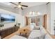 Open living room with vaulted ceilings, fireplace, and ample natural light at 11408 Hickory Grove Church Rd, Raleigh, NC 27613