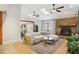 Comfortable living room with stone fireplace and neutral color palette at 11408 Hickory Grove Church Rd, Raleigh, NC 27613