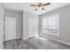 Spacious bedroom featuring a ceiling fan, closet and wood flooring at 138 Clear Water Rd, Louisburg, NC 27549