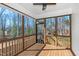 Relaxing screened porch with wood flooring and an airy feel at 138 Clear Water Rd, Louisburg, NC 27549