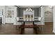 Cozy dining room with wood table, bench, and upholstered chairs at 140 Southern Acres Dr, Fuquay Varina, NC 27526
