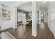 Open-concept dining space with chandelier lighting and seamless flow into the living areas at 140 Southern Acres Dr, Fuquay Varina, NC 27526