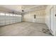 Spacious two car garage with a painted interior and automatic door at 140 Southern Acres Dr, Fuquay Varina, NC 27526