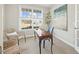 Bright home office with a quaint desk, comfortable seating, and a calming atmosphere at 140 Southern Acres Dr, Fuquay Varina, NC 27526