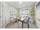 Bright home office with a quaint desk, comfortable seating, and a calming atmosphere at 140 Southern Acres Dr, Fuquay Varina, NC 27526