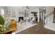 Inviting living room with a fireplace, built-in shelving, and lots of natural light at 140 Southern Acres Dr, Fuquay Varina, NC 27526