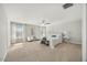 Spacious main bedroom featuring natural light, neutral colors, and a ceiling fan at 140 Southern Acres Dr, Fuquay Varina, NC 27526