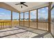 Screened porch with ceiling fan offering an outdoor living space at 140 Southern Acres Dr, Fuquay Varina, NC 27526