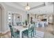 Bright dining area featuring modern lighting and an open floor plan to kitchen at 142 Oban Dr, Homesite 135, Sanford, NC 27330