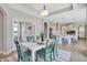 This open-concept dining room and kitchen features ample space for entertaining guests at 142 Oban Dr, Homesite 135, Sanford, NC 27330