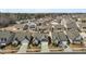 Aerial view of a neighborhood showcasing beautiful homes and manicured lawns at 1435 Monterey Bay Dr, Wake Forest, NC 27587