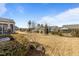 Expansive backyard featuring mature trees, manicured landscaping and a partial home view at 1435 Monterey Bay Dr, Wake Forest, NC 27587