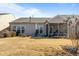 Well-maintained backyard featuring a covered porch and outdoor patio area for entertaining at 1435 Monterey Bay Dr, Wake Forest, NC 27587