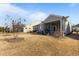 Spacious backyard with patio, screened in porch and tidy landscaping at 1435 Monterey Bay Dr, Wake Forest, NC 27587