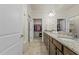 Bathroom with a double vanity, granite counters, walk-in closet and separate toilet and shower at 1435 Monterey Bay Dr, Wake Forest, NC 27587