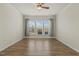 Well-lit bedroom with a ceiling fan and large windows providing plenty of natural light at 1435 Monterey Bay Dr, Wake Forest, NC 27587