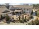 Stunning clubhouse featuring an outdoor lounge area, fireplace, tables, and beautifully landscaped grounds at 1435 Monterey Bay Dr, Wake Forest, NC 27587