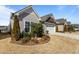Charming home exterior with a well-manicured lawn and landscaping at 1435 Monterey Bay Dr, Wake Forest, NC 27587