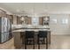 Modern kitchen with stainless steel appliances, granite countertops, and pendant lighting above the island at 1435 Monterey Bay Dr, Wake Forest, NC 27587