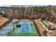 A view of the community tennis and bocce ball courts surrounded by lush greenery at 1435 Monterey Bay Dr, Wake Forest, NC 27587