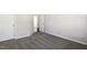 Empty bedroom with gray carpet and neutral paint at 192 Springhill Ln, Garner, NC 27529