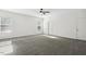 Spacious primary bedroom with lots of natural light and neutral carpet at 192 Springhill Ln, Garner, NC 27529