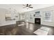 Spacious open-concept living area with hardwood floors connecting the kitchen and living room at 192 Springhill Ln, Garner, NC 27529