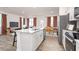Modern kitchen features a central island, stainless steel appliances, and open layout at 231 Perseus St, Angier, NC 27501