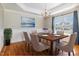 Formal dining room with elegant chandelier and large window at 24 Carter Dr, Sanford, NC 27332