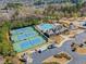 Aerial view of the community with tennis courts, swimming pool, playground and a clubhouse at 2437 Cedar Rock Dr, Wake Forest, NC 27587