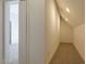 Finished attic space featuring neutral carpet and built in storage at 25 Blackhorn Ct, Pittsboro, NC 27312