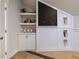 Finished attic space featuring a chalkboard and shelving at 25 Blackhorn Ct, Pittsboro, NC 27312