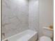 Modern bathroom showcasing sleek marble tiling in the shower at 25 Blackhorn Ct, Pittsboro, NC 27312