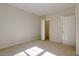 Sun-drenched bedroom with neutral carpeting and a door leading to a closet or ensuite at 25 Blackhorn Ct, Pittsboro, NC 27312