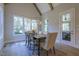 Dining room with natural light, modern light fixture, and wood floors at 25 Blackhorn Ct, Pittsboro, NC 27312