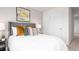 Bedroom with art hanging above the bed at 251 Perseus St, Angier, NC 27501