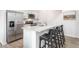 Sleek kitchen with stainless steel appliances, granite countertops, and a functional breakfast bar at 251 Perseus St, Angier, NC 27501