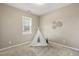 Cozy bedroom with neutral walls, carpet, and a cute teepee tent at 3333 Sandy Meadows Dr, Fuquay Varina, NC 27526