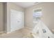 Neutral bedroom features a tent, window, and double closet at 3333 Sandy Meadows Dr, Fuquay Varina, NC 27526