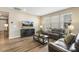 Inviting living room featuring a comfortable seating arrangement and natural light from the windows at 3333 Sandy Meadows Dr, Fuquay Varina, NC 27526