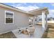 Covered patio with seating perfect for relaxing and enjoying the outdoor space at 3333 Sandy Meadows Dr, Fuquay Varina, NC 27526